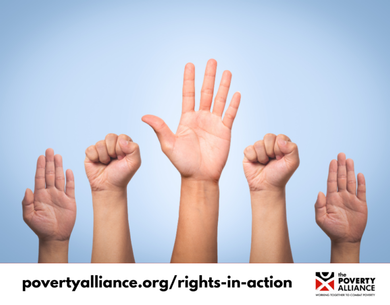 A stock image of people raising their fists together to represent the fulfilment of human rights.