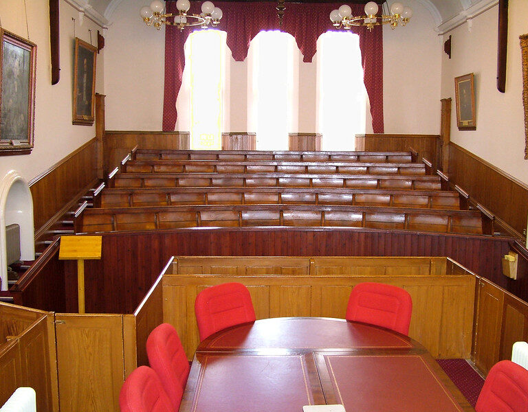 Scottish Sheriff Court, looking down from where the Judge Sheriff would sit. Image courtesy of Mike McBey https://www.flickr.com/photos/158652122@N02/