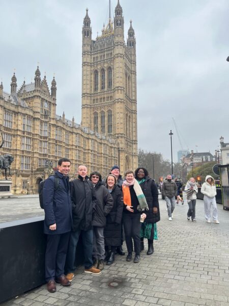 Isla McIntosh and David Reilly of the Poverty Alliance, with lived experience creators at the launch of the Fair By Design Give Me Some Credit exhibition. February 2025.